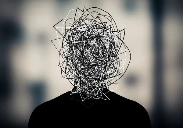 Person confused by emotions, represented as tangled thoughts.